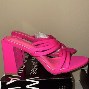 Neon pink chunky heel sandals